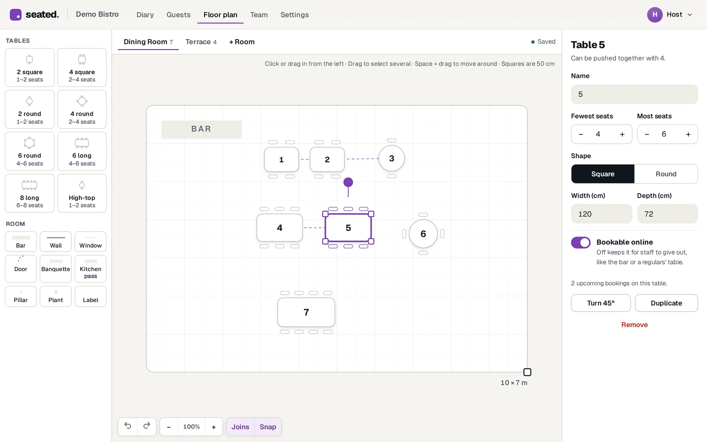 The Seated floor plan editor with tables, chairs and a details panel for table 5